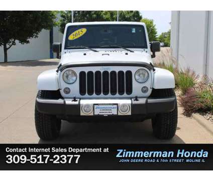 2015 Jeep Wrangler Unlimited Sahara is a White 2015 Jeep Wrangler Unlimited Sahara Car for Sale in Moline IL