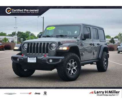 2021 Jeep Wrangler Unlimited Rubicon is a Grey 2021 Jeep Wrangler Unlimited Car for Sale in Denver CO
