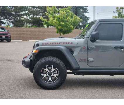 2021 Jeep Wrangler Unlimited Rubicon is a Grey 2021 Jeep Wrangler Unlimited Car for Sale in Denver CO