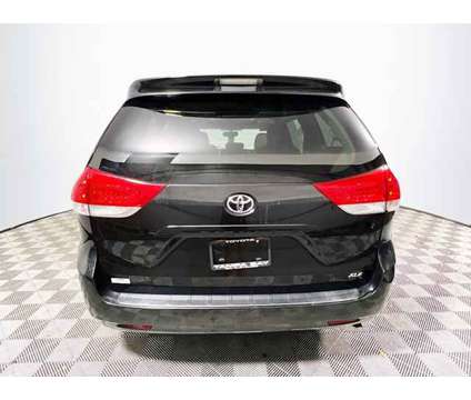 2011 Toyota Sienna XLE is a Black 2011 Toyota Sienna XLE Car for Sale in Tampa FL