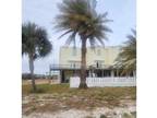 Foreclosure Property: W Beach Blvd