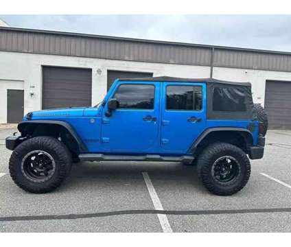 2015 Jeep Wrangler for sale is a Blue 2015 Jeep Wrangler Car for Sale in Fredericksburg VA