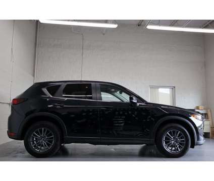 2021 Mazda CX-5 Touring is a Black 2021 Mazda CX-5 Touring SUV in Orchard Park NY