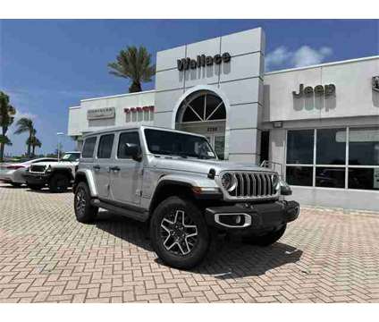 2024 Jeep Wrangler Sahara is a Silver 2024 Jeep Wrangler Sahara SUV in Stuart FL