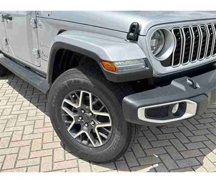 2024 Jeep Wrangler Sahara is a Silver 2024 Jeep Wrangler Sahara SUV in Stuart FL