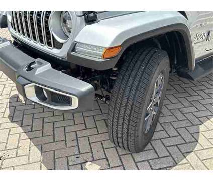 2024 Jeep Wrangler Sahara is a Silver 2024 Jeep Wrangler Sahara SUV in Stuart FL