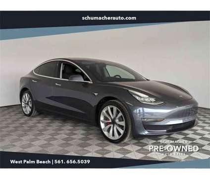2020 Tesla Model 3 Standard Range Plus is a Grey 2020 Tesla Model 3 Sedan in West Palm Beach FL