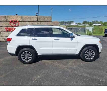 2015 Jeep Grand Cherokee Limited is a White 2015 Jeep grand cherokee Limited SUV in Dubuque IA