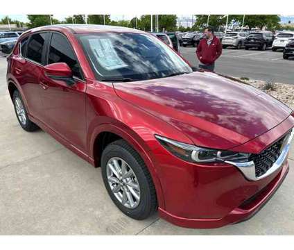 2024 Mazda CX-5 2.5 S Select Package is a Red 2024 Mazda CX-5 SUV in Sandy UT