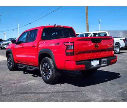 2023 Nissan Frontier Crew Cab PRO-4X 4x4 is a Red 2023 Nissan frontier Truck in Cheyenne WY