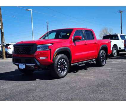 2023 Nissan Frontier Crew Cab PRO-4X 4x4 is a Red 2023 Nissan frontier Truck in Cheyenne WY