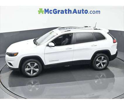 2021 Jeep Cherokee Limited 4X4 is a White 2021 Jeep Cherokee Limited SUV in Dubuque IA