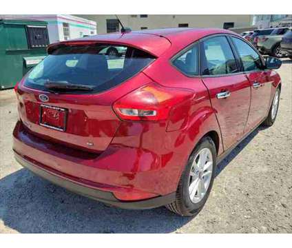 2016 Ford Focus SE is a Red 2016 Ford Focus SE Hatchback in Hanover PA