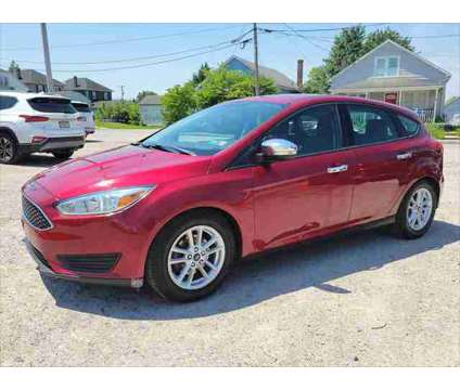 2016 Ford Focus SE is a Red 2016 Ford Focus SE Hatchback in Hanover PA