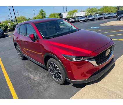 2022 Mazda CX-5 2.5 S Premium Plus is a Red 2022 Mazda CX-5 SUV in Brunswick OH