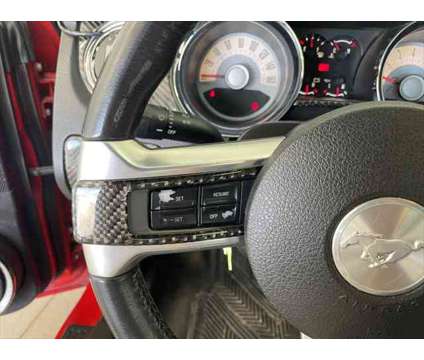 2012 Ford Mustang GT is a Red 2012 Ford Mustang GT Coupe in Logan UT