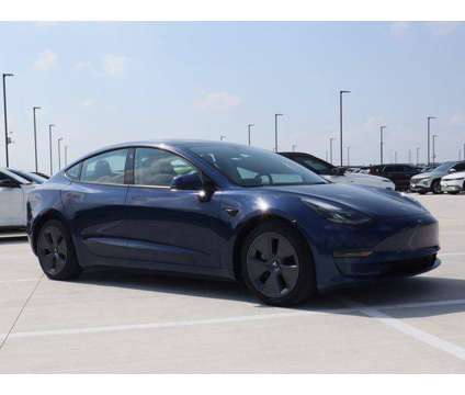 2022 Tesla Model 3 Long Range Dual Motor All-Wheel Drive is a Blue 2022 Tesla Model 3 Long Range Sedan in Friendswood TX