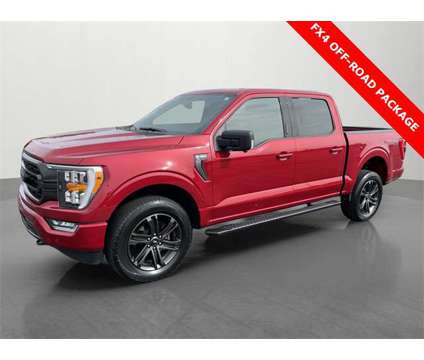 2021 Ford F-150 XLT is a Red 2021 Ford F-150 XLT Truck in Roanoke IL