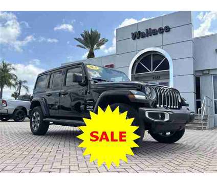 2019 Jeep Wrangler Unlimited Sahara is a Black 2019 Jeep Wrangler Unlimited Sahara SUV in Stuart FL