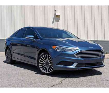 2018 Ford Fusion SE is a Blue 2018 Ford Fusion SE Sedan in Ogden UT