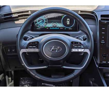 2022 Hyundai Tucson Hybrid SEL Convenience is a Grey 2022 Hyundai Tucson Hybrid in Kennesaw GA