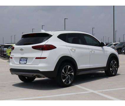 2020 Hyundai Tucson Sport is a White 2020 Hyundai Tucson Sport SUV in Friendswood TX