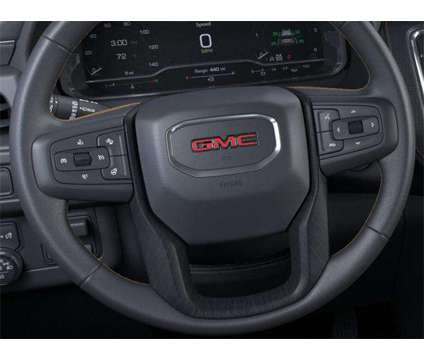 2024 GMC Yukon 4WD AT4 is a Black 2024 GMC Yukon 4WD SUV in Logan UT