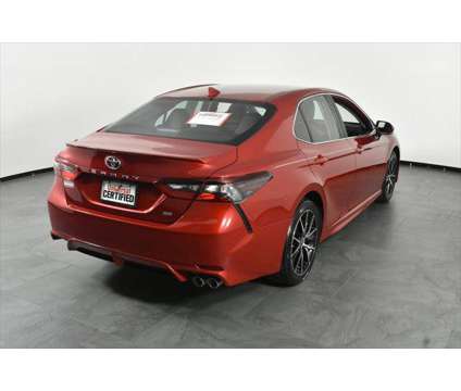 2021 Toyota Camry SE is a Red 2021 Toyota Camry SE Sedan in Orlando FL