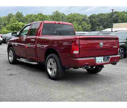 2014 Ram 1500 Express is a Red 2014 RAM 1500 Model Express Truck in Bowie MD