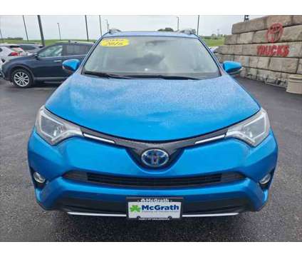 2016 Toyota RAV4 Hybrid XLE is a Blue 2016 Toyota RAV4 Hybrid XLE Hybrid in Dubuque IA