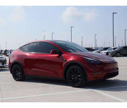 2024 Tesla Model Y Long Range Dual Motor All-Wheel Drive is a Red 2024 Station Wagon in Friendswood TX