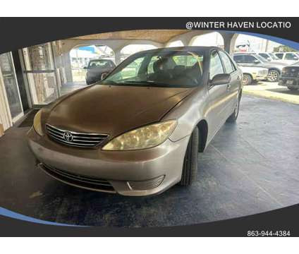 2006 Toyota Camry for sale is a Grey 2006 Toyota Camry Car for Sale in Haines City FL
