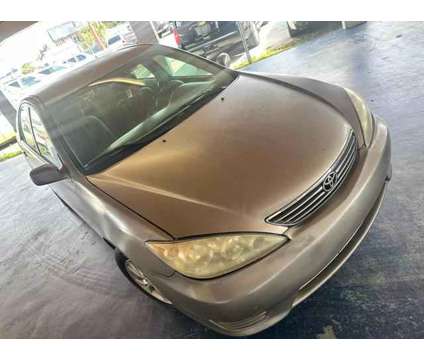 2006 Toyota Camry for sale is a Grey 2006 Toyota Camry Car for Sale in Haines City FL
