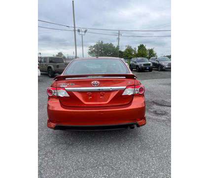 2013 Toyota Corolla for sale is a Orange 2013 Toyota Corolla Car for Sale in Hyattsville MD