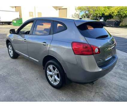 2011 Nissan Rogue for sale is a Tan 2011 Nissan Rogue Car for Sale in North Lauderdale FL