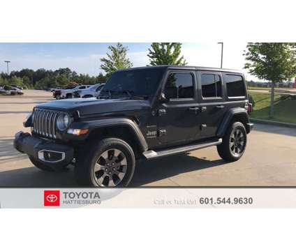 2019 Jeep Wrangler Unlimited Sahara is a Grey 2019 Jeep Wrangler Unlimited Sahara Car for Sale in Hattiesburg MS