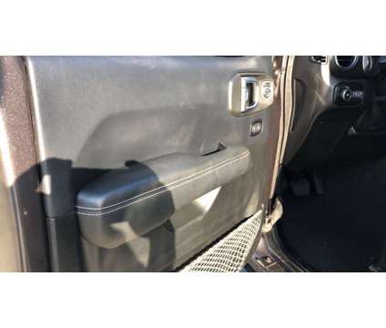 2019 Jeep Wrangler Unlimited Sahara is a Grey 2019 Jeep Wrangler Unlimited Sahara Car for Sale in Hattiesburg MS