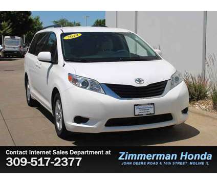 2014 Toyota Sienna LE is a White 2014 Toyota Sienna LE Car for Sale in Moline IL