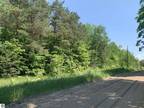 Mancelona, Nicely wooded 2.5 acre parcel on Simpson Rd just