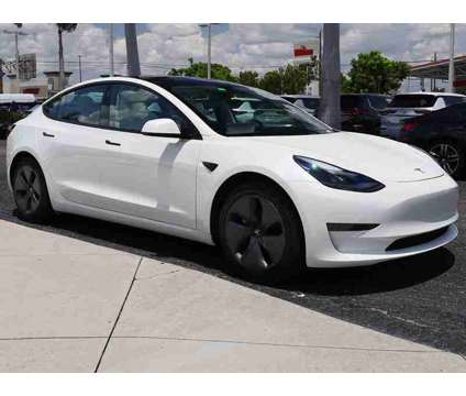 2021 Tesla Model 3 Standard Range Plus is a White 2021 Tesla Model 3 Sedan in Fort Myers FL
