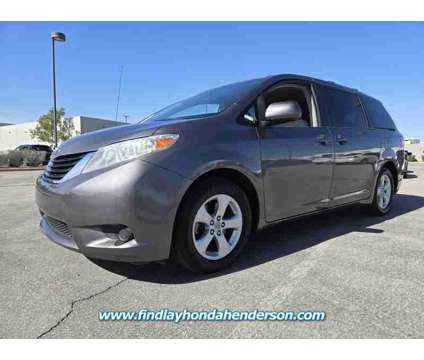 2011 Toyota Sienna Base is a Grey 2011 Toyota Sienna Base Car for Sale in Henderson NV