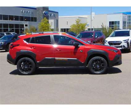 2024 Subaru Crosstrek Wilderness is a Red 2024 Subaru Crosstrek 2.0i SUV in Santa Fe NM