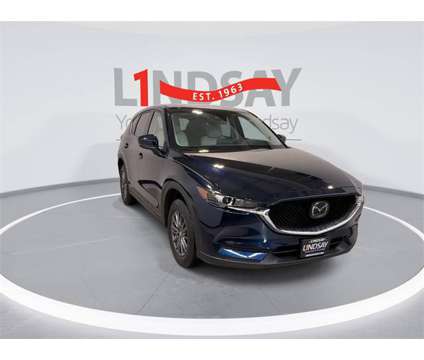 2021 Mazda CX-5 Touring is a Blue 2021 Mazda CX-5 Touring SUV in Manassas VA