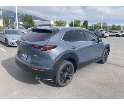 2024 Mazda CX-30 2.5 Turbo Premium Package is a Grey 2024 Mazda CX-3 SUV in Sandy UT