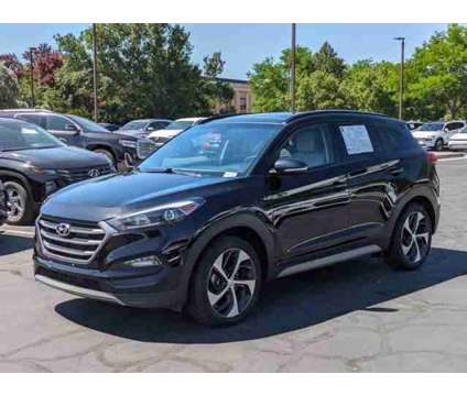 2018 Hyundai Tucson Value is a Black 2018 Hyundai Tucson Value SUV in Sandy UT