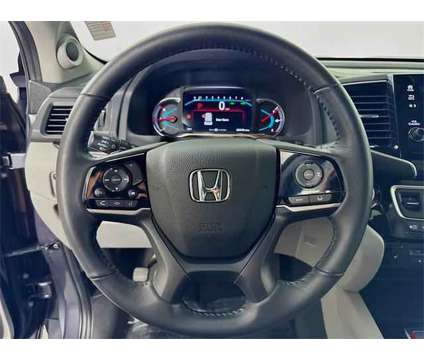 2020 Honda Pilot 2WD Touring 7 Passenger is a Grey 2020 Honda Pilot 2WD Touring SUV in Saint Augustine FL