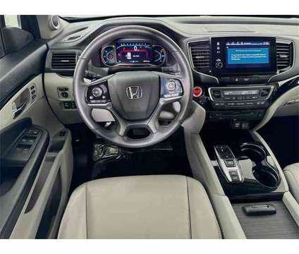 2020 Honda Pilot 2WD Touring 7 Passenger is a Grey 2020 Honda Pilot 2WD Touring SUV in Saint Augustine FL
