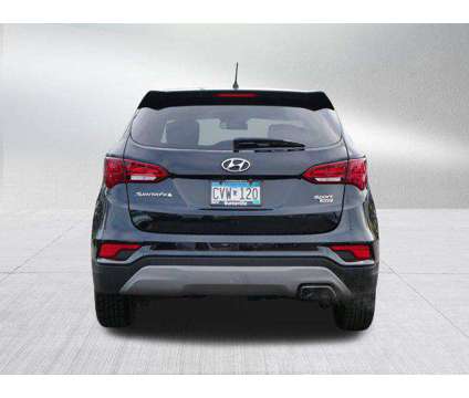 2018 Hyundai Santa Fe Sport 2.4L is a Black 2018 Hyundai Santa Fe Sport 2.4L Car for Sale in Burnsville MN