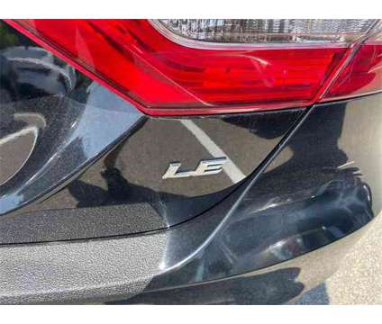 2020 Toyota Camry LE is a Black 2020 Toyota Camry LE Sedan in Fall River MA