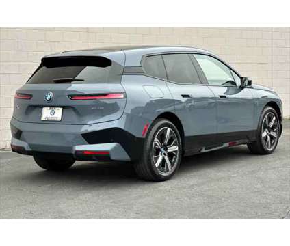 2025 BMW iX xDrive50 is a 2025 BMW 325 Model iX SUV in Seaside CA
